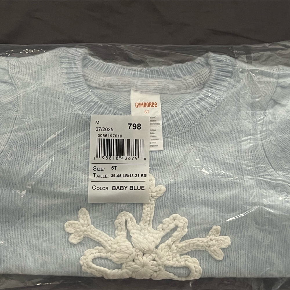 Baby Blue Sweater with White Crochet snowflake Detail
